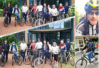 Gruppenfoto von PGMM-Mitarbeiterinnen und Mitarbeitern mit Fahrrad am Standort Dresden zum Weltfahrradtag 2023